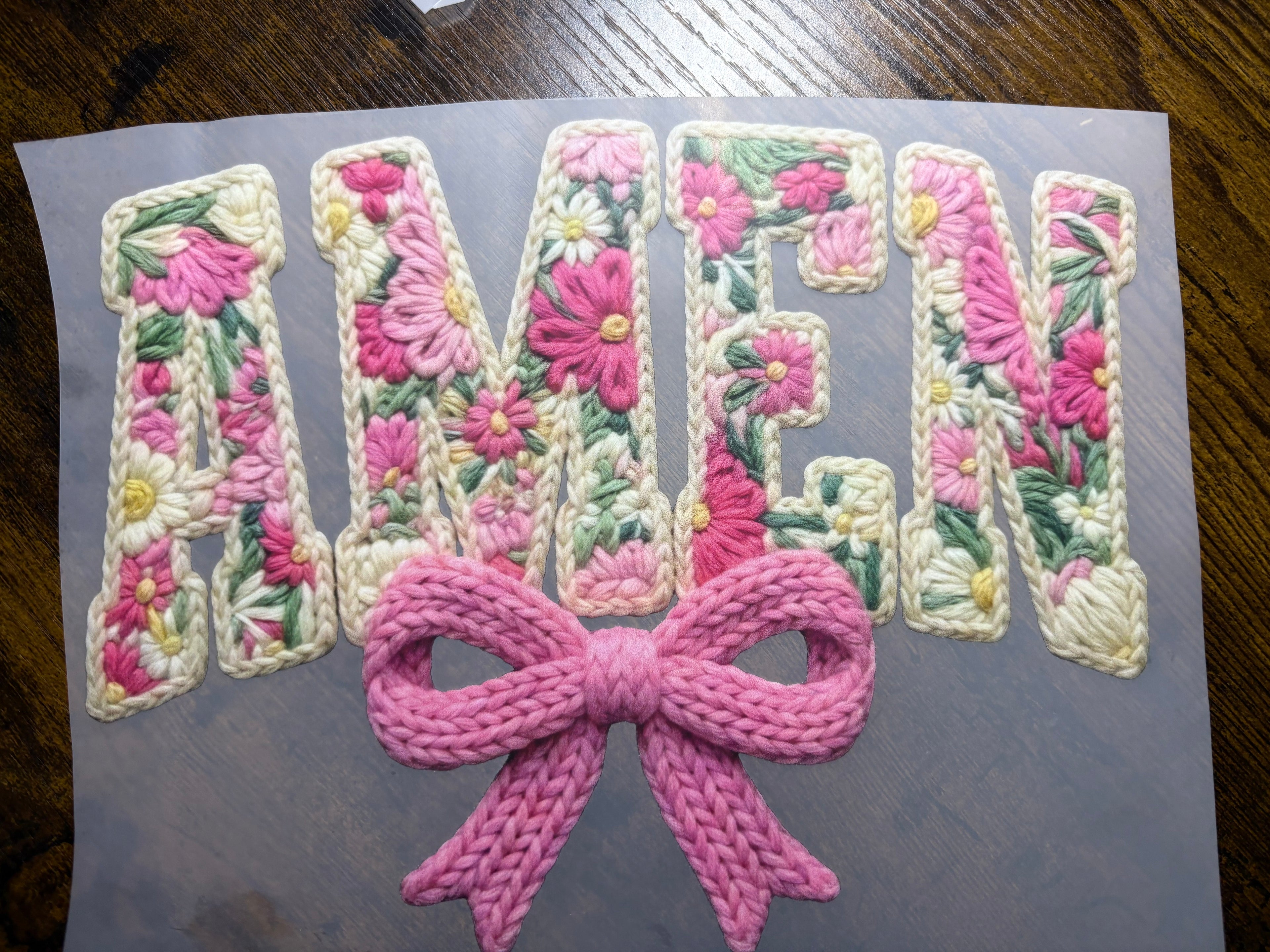 Amen with a pink bow